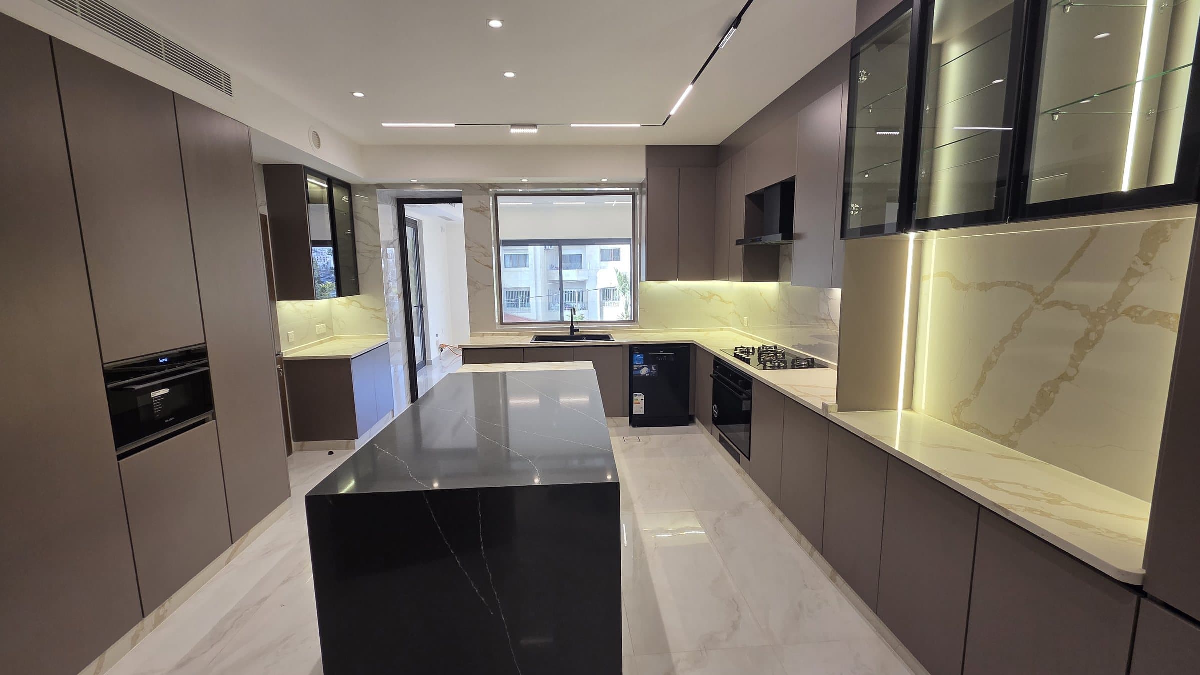 Residence 102 — Kitchen from entrance