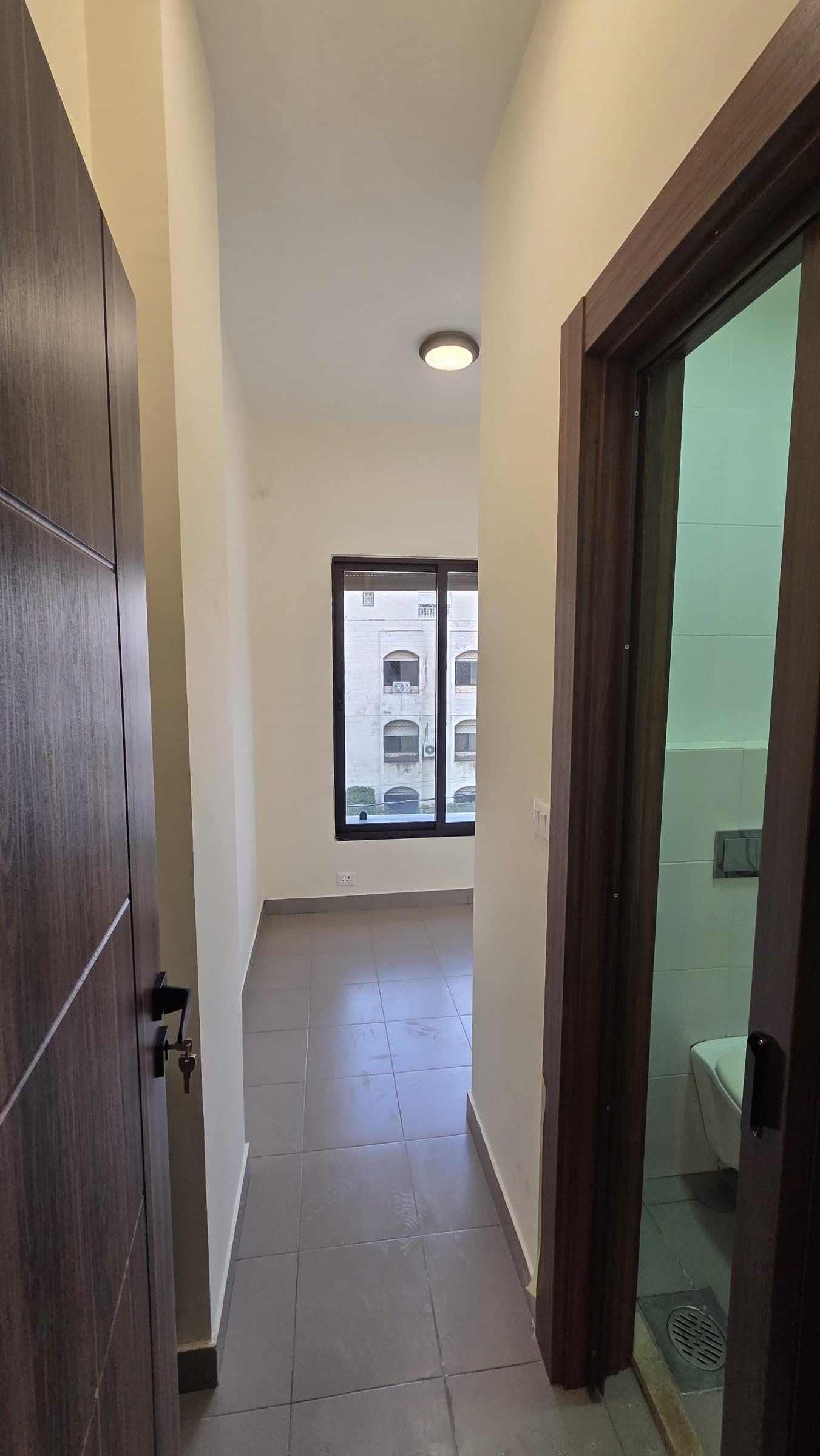 Residence 201 — Maids Room and Bathroom