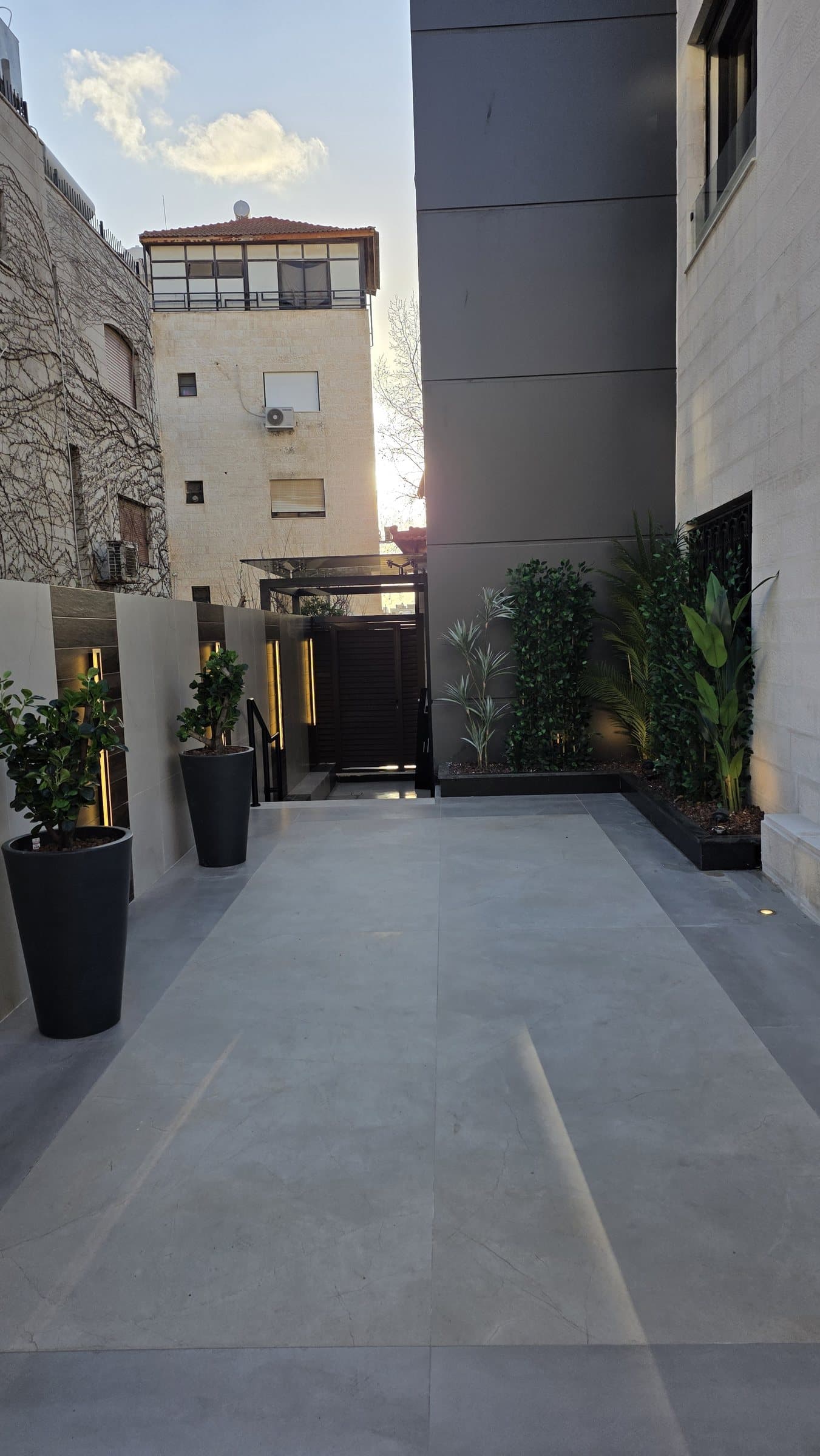 SHIHAB Elite Residences — Entrance showing elevator building